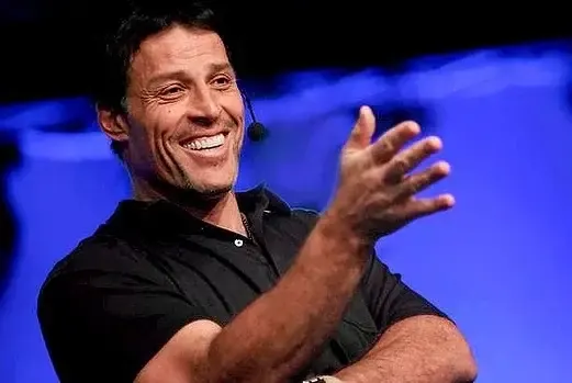 Tony Robbins speaking on stage